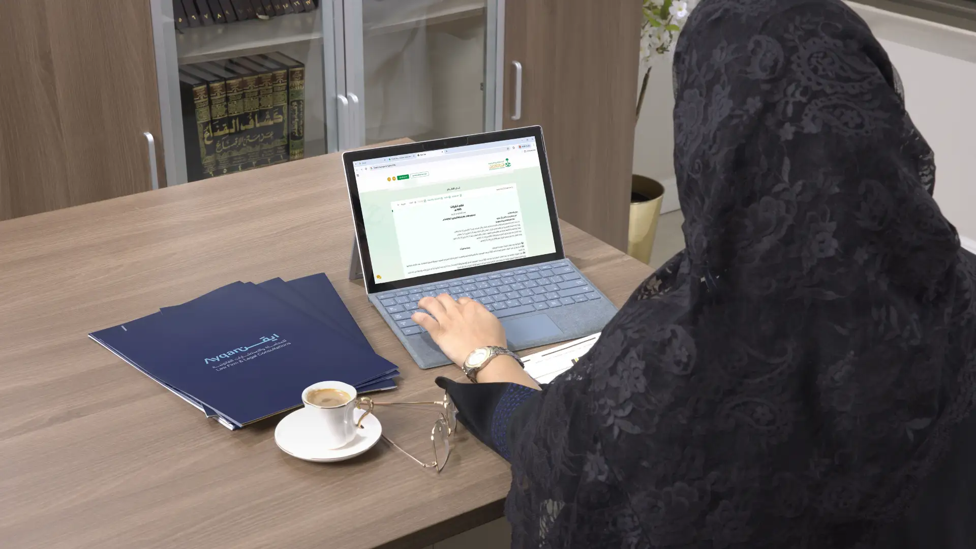 Ayqan lawyer working on legal documents