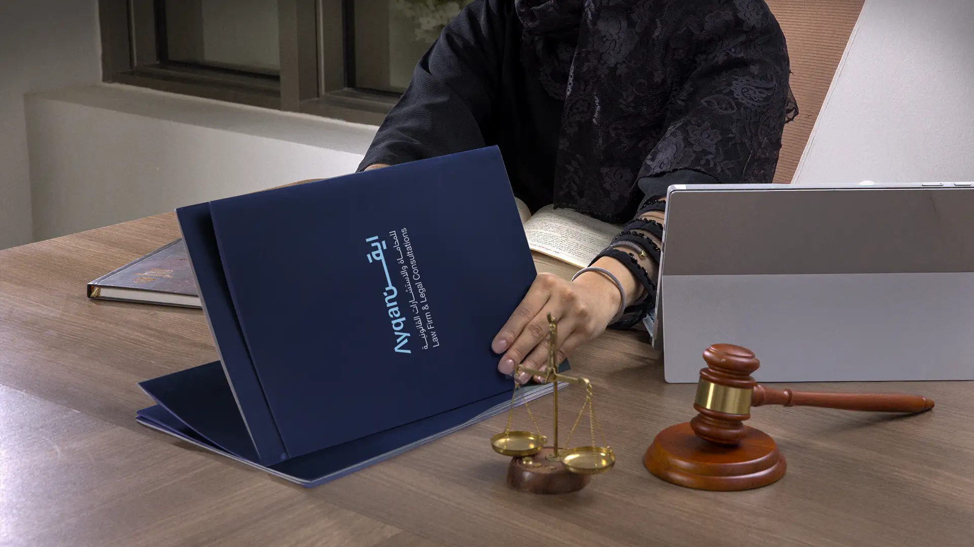Ayqan legal team reviewing case documents